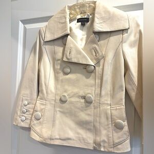 Real leather cropped sleeve jacket. Cream colored perfect for spring.